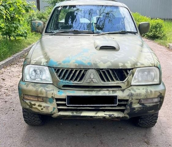 Білий Міцубісі Л 200, об'ємом двигуна 2.5 л та пробігом 3 тис. км за 4700 $, фото 1 на Automoto.ua