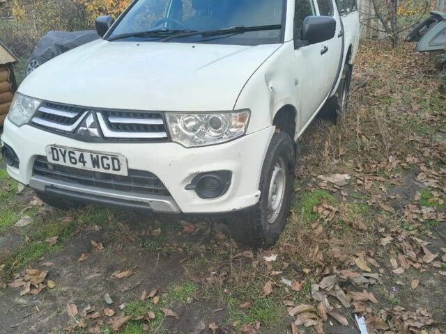 Белый Мицубиси Л 200, объемом двигателя 2.5 л и пробегом 134 тыс. км за 7200 $, фото 1 на Automoto.ua