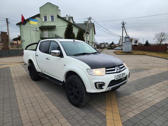 Белый Мицубиси Л 200, объемом двигателя 2.5 л и пробегом 114 тыс. км за 8510 $, фото 1 на Automoto.ua