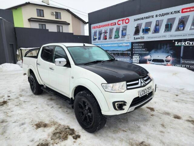 Білий Міцубісі Л 200, об'ємом двигуна 0 л та пробігом 114 тис. км за 8325 $, фото 1 на Automoto.ua