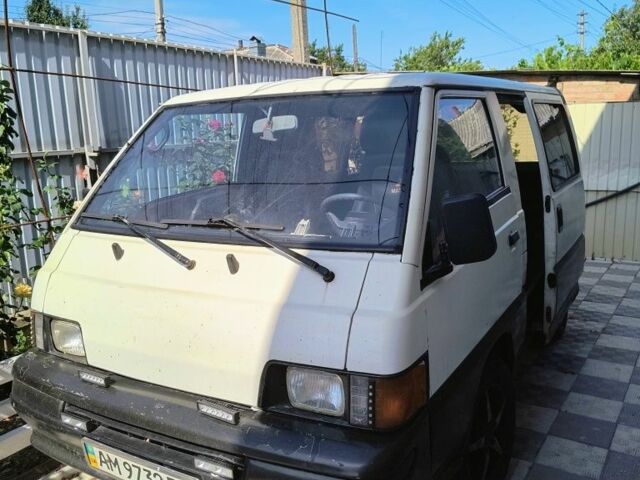 Білий Міцубісі Л 200, об'ємом двигуна 2 л та пробігом 500 тис. км за 1205 $, фото 1 на Automoto.ua