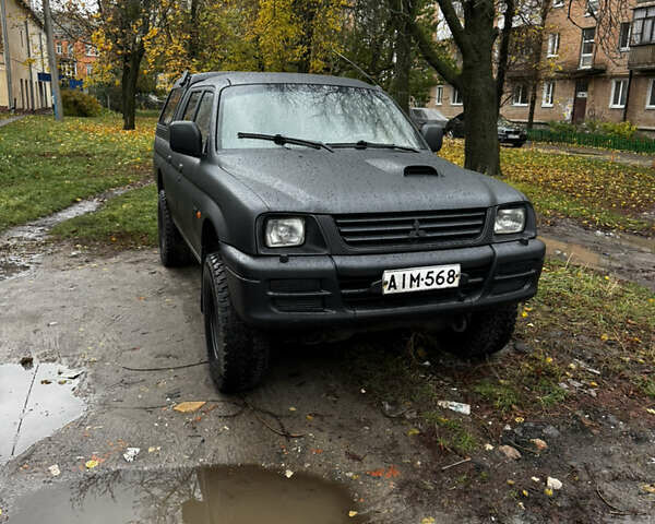 Мицубиси Л 200 1997 в Полтаве на Automoto.ua Черный Мицубиси Л 200, объемом двигателя 2.5 л и пробегом 600 тыс. км за 6500 $, фото 1 на Automoto.ua