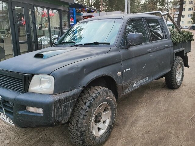 Чорний Міцубісі Л 200, об'ємом двигуна 0 л та пробігом 217 тис. км за 4300 $, фото 1 на Automoto.ua
