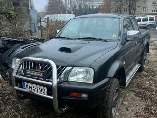 Чорний Міцубісі Л 200, об'ємом двигуна 2.5 л та пробігом 308 тис. км за 5000 $, фото 1 на Automoto.ua