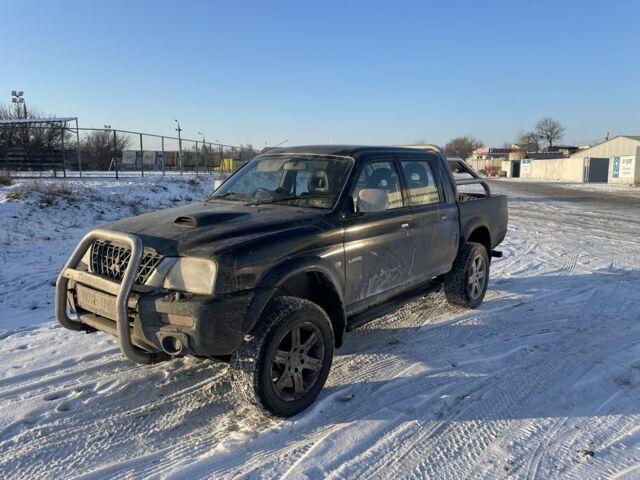 Чорний Міцубісі Л 200, об'ємом двигуна 2.5 л та пробігом 130 тис. км за 5200 $, фото 1 на Automoto.ua