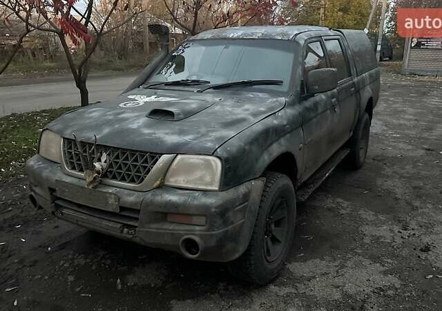 Черный Мицубиси Л 200, объемом двигателя 0 л и пробегом 300 тыс. км за 5000 $, фото 1 на Automoto.ua