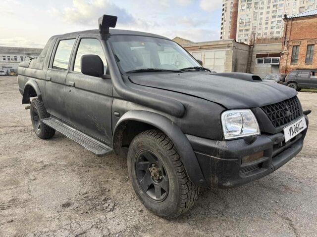 Мицубиси Л 200 2003 в Харькове на Automoto.ua Черный Мицубиси Л 200, объемом двигателя 3.2 л и пробегом 280 тыс. км за 3000 $, фото 1 на Automoto.ua