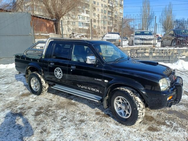 Черный Мицубиси Л 200, объемом двигателя 0 л и пробегом 217 тыс. км за 5300 $, фото 1 на Automoto.ua