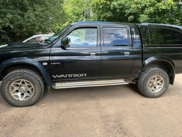 Черный Мицубиси Л 200, объемом двигателя 0 л и пробегом 150 тыс. км за 4667 $, фото 1 на Automoto.ua