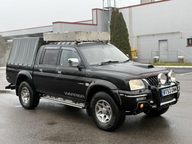 Чорний Міцубісі Л 200, об'ємом двигуна 0 л та пробігом 200 тис. км за 4600 $, фото 1 на Automoto.ua