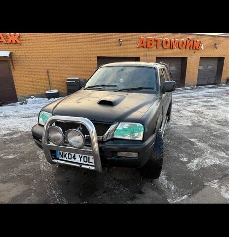 Чорний Міцубісі Л 200, об'ємом двигуна 2.8 л та пробігом 250 тис. км за 4405 $, фото 1 на Automoto.ua