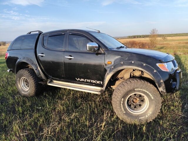 Черный Мицубиси Л 200, объемом двигателя 0 л и пробегом 160 тыс. км за 7578 $, фото 1 на Automoto.ua