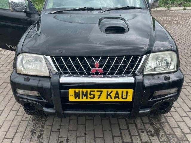 Мицубиси Л 200 2006 в Белой Церкве на Automoto.ua Черный Мицубиси Л 200, объемом двигателя 0 л и пробегом 300 тыс. км за 4500 $, фото 1 на Automoto.ua