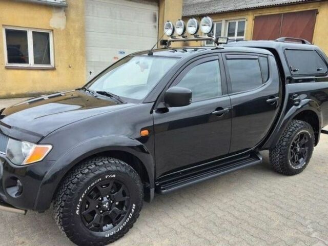 Черный Мицубиси Л 200, объемом двигателя 2.5 л и пробегом 278 тыс. км за 4200 $, фото 1 на Automoto.ua