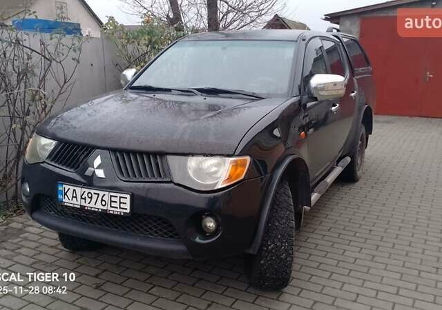 Чорний Міцубісі Л 200, об'ємом двигуна 2.48 л та пробігом 198 тис. км за 11500 $, фото 1 на Automoto.ua