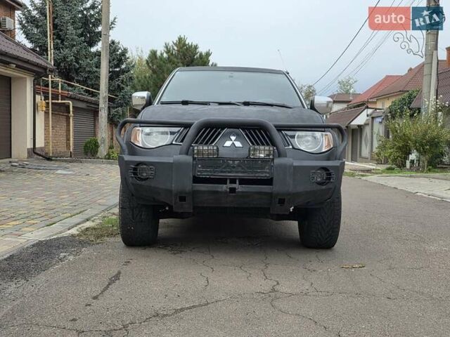 Мицубиси Л 200 2007 в Одессе на Automoto.ua Черный Мицубиси Л 200, объемом двигателя 2.48 л и пробегом 186 тыс. км за 12200 $, фото 1 на Automoto.ua