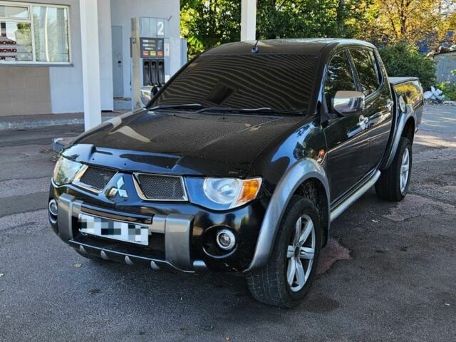 Чорний Міцубісі Л 200, об'ємом двигуна 2.5 л та пробігом 230 тис. км за 5850 $, фото 1 на Automoto.ua