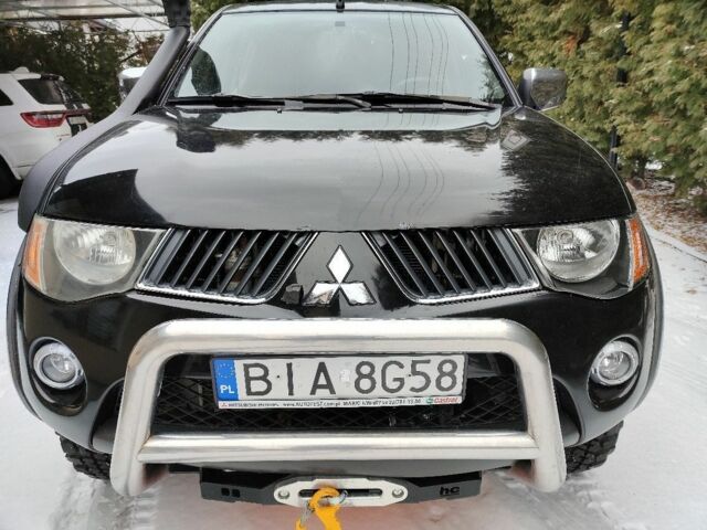 Черный Мицубиси Л 200, объемом двигателя 2.5 л и пробегом 233 тыс. км за 3100 $, фото 1 на Automoto.ua