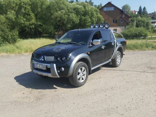 Чорний Міцубісі Л 200, об'ємом двигуна 2.5 л та пробігом 200 тис. км за 8756 $, фото 1 на Automoto.ua