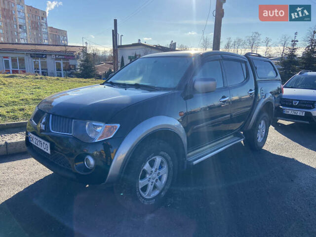 Чорний Міцубісі Л 200, об'ємом двигуна 2.48 л та пробігом 219 тис. км за 10500 $, фото 1 на Automoto.ua