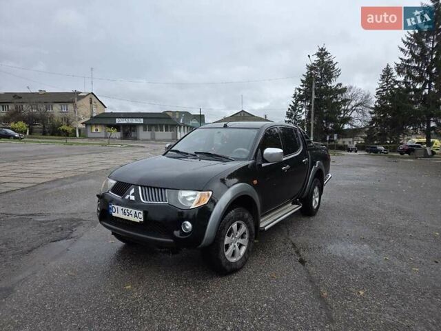 Чорний Міцубісі Л 200, об'ємом двигуна 2.48 л та пробігом 302 тис. км за 12500 $, фото 1 на Automoto.ua