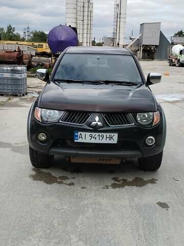 Черный Мицубиси Л 200, объемом двигателя 2.48 л и пробегом 291 тыс. км за 11000 $, фото 1 на Automoto.ua
