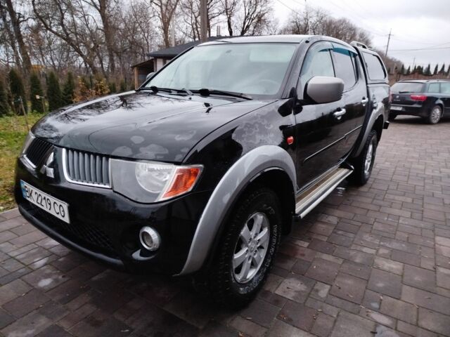 Чорний Міцубісі Л 200, об'ємом двигуна 2.5 л та пробігом 220 тис. км за 10500 $, фото 1 на Automoto.ua