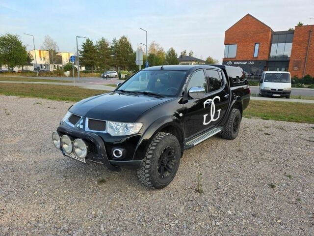 Черный Мицубиси Л 200, объемом двигателя 2.5 л и пробегом 213 тыс. км за 3006 $, фото 1 на Automoto.ua