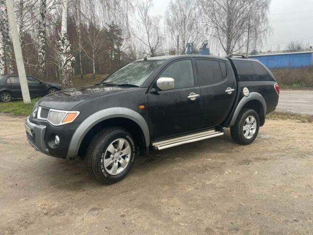 Черный Мицубиси Л 200, объемом двигателя 2.5 л и пробегом 145 тыс. км за 6800 $, фото 1 на Automoto.ua