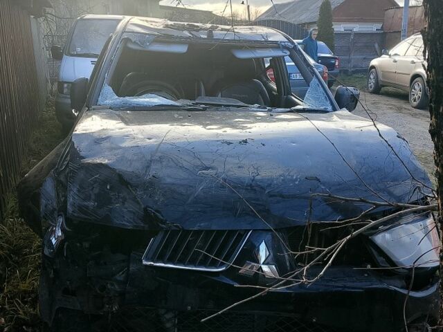 Черный Мицубиси Л 200, объемом двигателя 0 л и пробегом 230 тыс. км за 1420 $, фото 1 на Automoto.ua