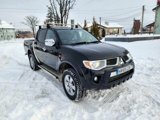 Чорний Міцубісі Л 200, об'ємом двигуна 2.5 л та пробігом 172 тис. км за 8174 $, фото 1 на Automoto.ua