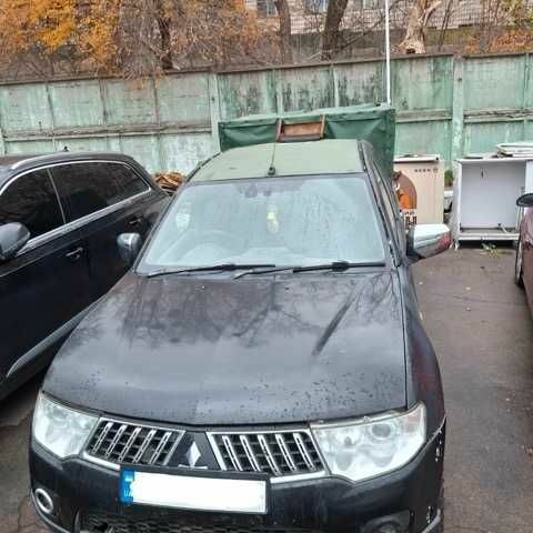 Чорний Міцубісі Л 200, об'ємом двигуна 2.5 л та пробігом 270 тис. км за 4500 $, фото 1 на Automoto.ua