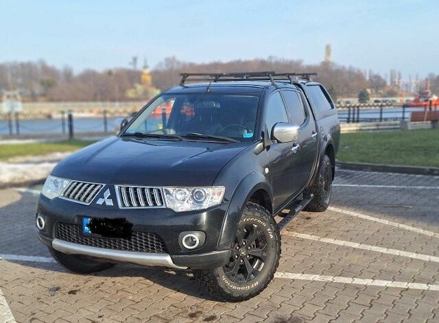 Чорний Міцубісі Л 200, об'ємом двигуна 2.5 л та пробігом 184 тис. км за 4002 $, фото 1 на Automoto.ua