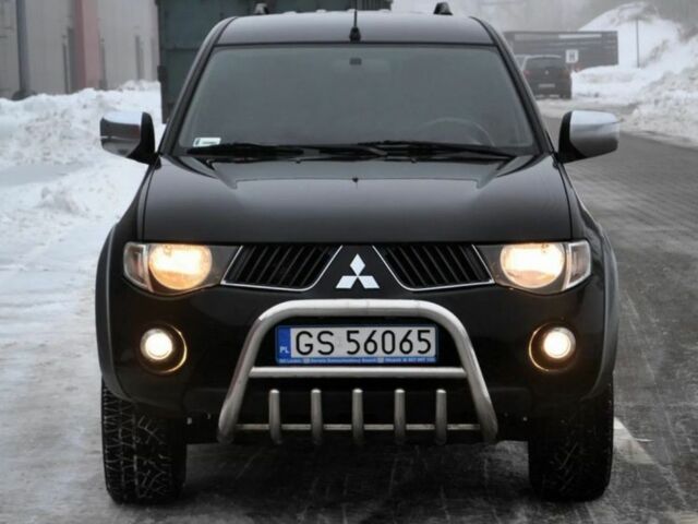 Черный Мицубиси Л 200, объемом двигателя 2.5 л и пробегом 214 тыс. км за 4950 $, фото 1 на Automoto.ua