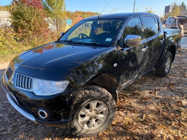 Черный Мицубиси Л 200, объемом двигателя 2.5 л и пробегом 163 тыс. км за 7600 $, фото 1 на Automoto.ua