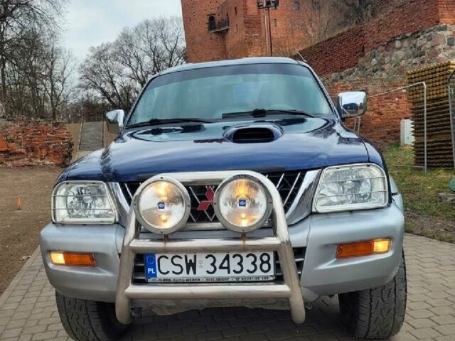 Сірий Міцубісі Л 200, об'ємом двигуна 2.5 л та пробігом 300 тис. км за 2200 $, фото 1 на Automoto.ua