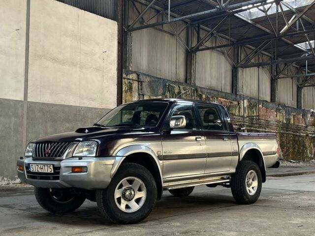 Серый Мицубиси Л 200, объемом двигателя 2.5 л и пробегом 232 тыс. км за 2700 $, фото 1 на Automoto.ua