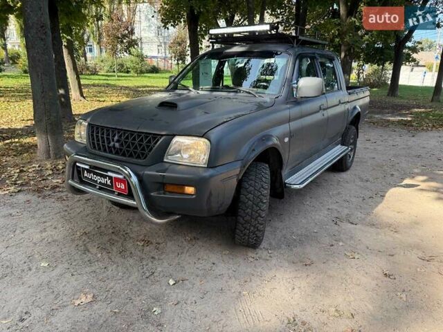 Серый Мицубиси Л 200, объемом двигателя 2.5 л и пробегом 621 тыс. км за 8790 $, фото 1 на Automoto.ua