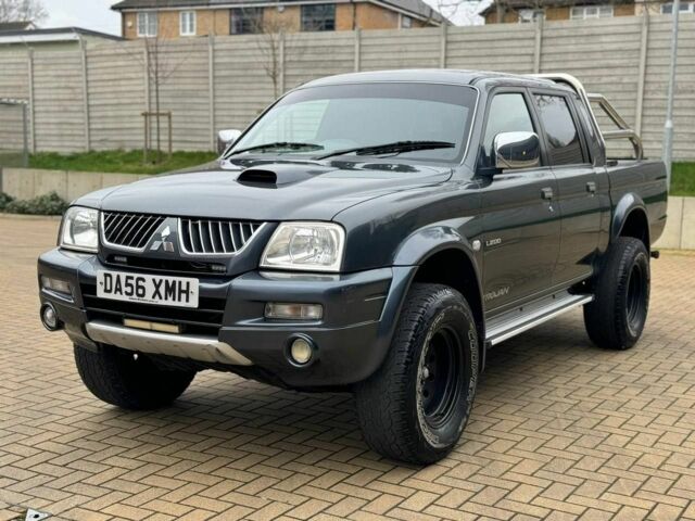 Серый Мицубиси Л 200, объемом двигателя 2 л и пробегом 212 тыс. км за 9941 $, фото 1 на Automoto.ua