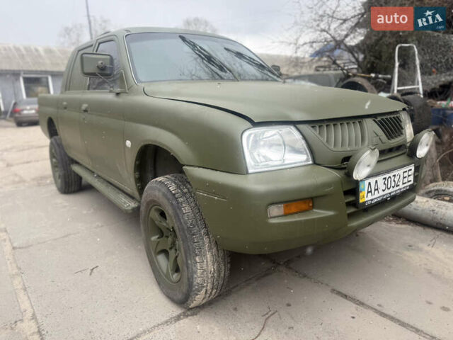 Серый Мицубиси Л 200, объемом двигателя 2.84 л и пробегом 287 тыс. км за 7770 $, фото 1 на Automoto.ua