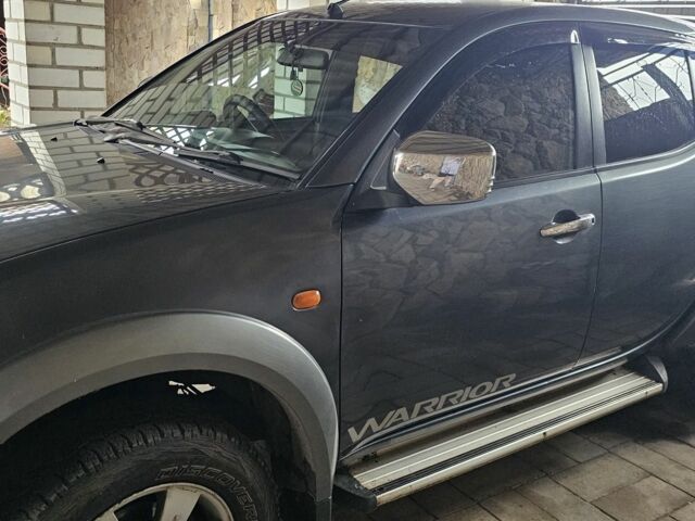 Серый Мицубиси Л 200, объемом двигателя 0 л и пробегом 234 тыс. км за 7000 $, фото 1 на Automoto.ua