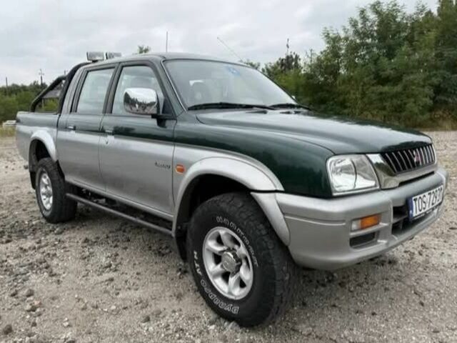 Сірий Міцубісі Л 200, об'ємом двигуна 2.5 л та пробігом 279 тис. км за 2650 $, фото 1 на Automoto.ua