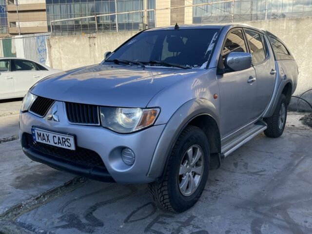 Серый Мицубиси Л 200, объемом двигателя 2.5 л и пробегом 230 тыс. км за 9700 $, фото 1 на Automoto.ua
