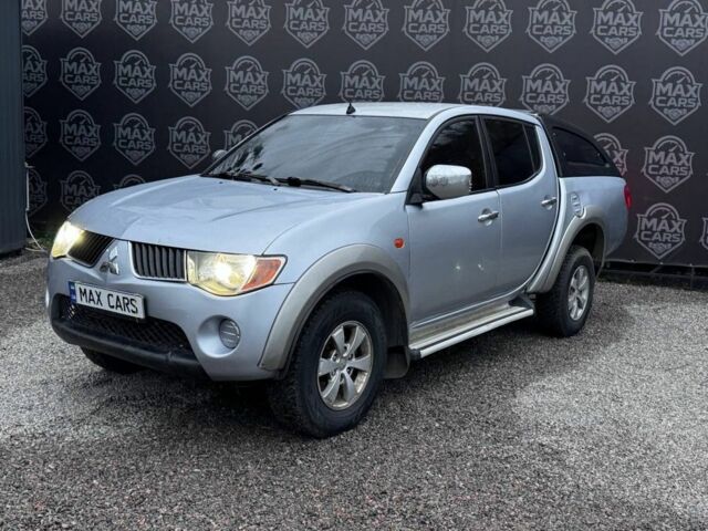 Серый Мицубиси Л 200, объемом двигателя 2.5 л и пробегом 260 тыс. км за 9900 $, фото 1 на Automoto.ua