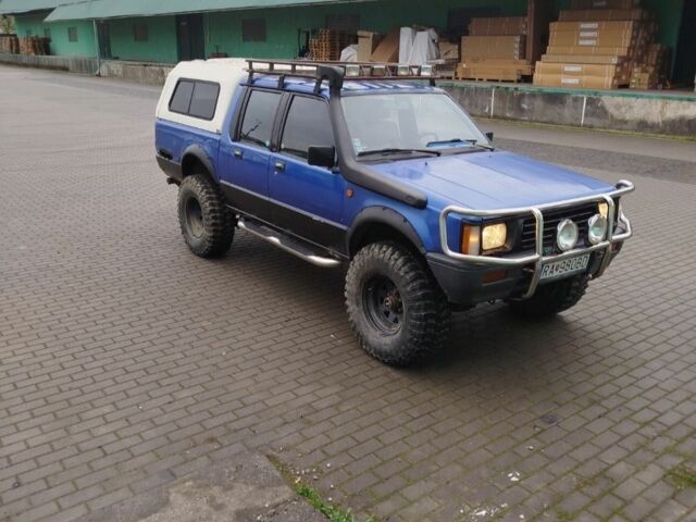 Синий Мицубиси Л 200, объемом двигателя 0 л и пробегом 334 тыс. км за 4350 $, фото 1 на Automoto.ua