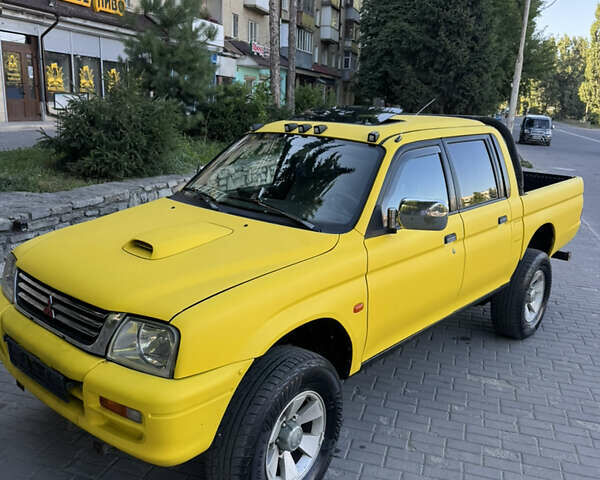 Синій Міцубісі Л 200, об'ємом двигуна 0 л та пробігом 300 тис. км за 6296 $, фото 1 на Automoto.ua