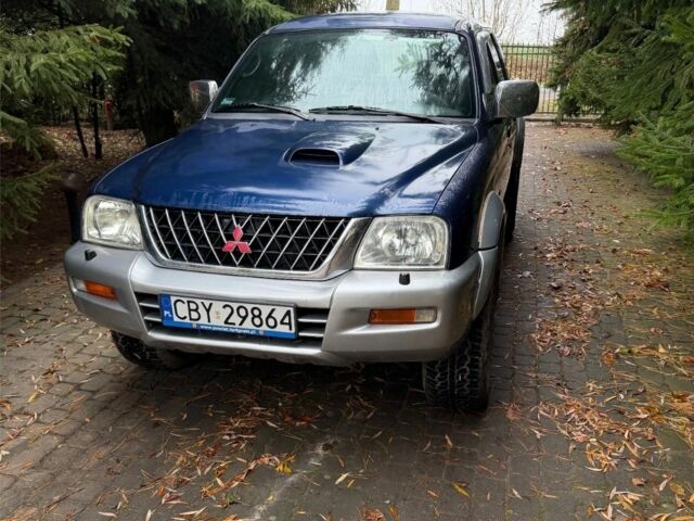 Синій Міцубісі Л 200, об'ємом двигуна 0 л та пробігом 211 тис. км за 2600 $, фото 1 на Automoto.ua