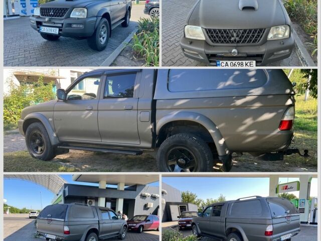 Синій Міцубісі Л 200, об'ємом двигуна 2.5 л та пробігом 347 тис. км за 10213 $, фото 1 на Automoto.ua