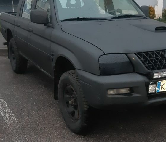 Синий Мицубиси Л 200, объемом двигателя 0 л и пробегом 324 тыс. км за 4700 $, фото 1 на Automoto.ua