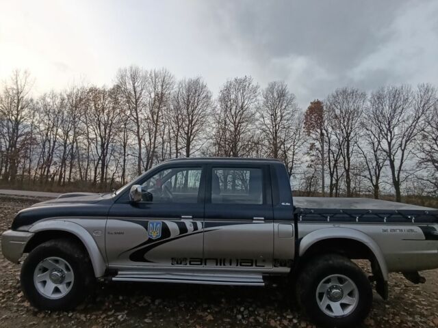 Синій Міцубісі Л 200, об'ємом двигуна 2.5 л та пробігом 276 тис. км за 5300 $, фото 1 на Automoto.ua